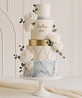 Свадебный торт голубой в четыре яруса с золотым декором и живыми цветами