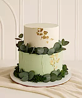Бело-зеленый свадебный торт с зеленью, пищевым золотом