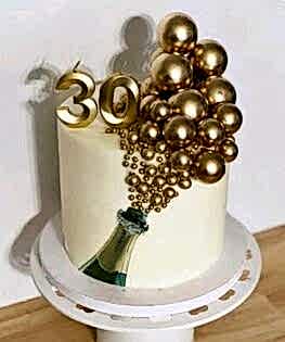 Торт на юбилей с шоколадными шарами